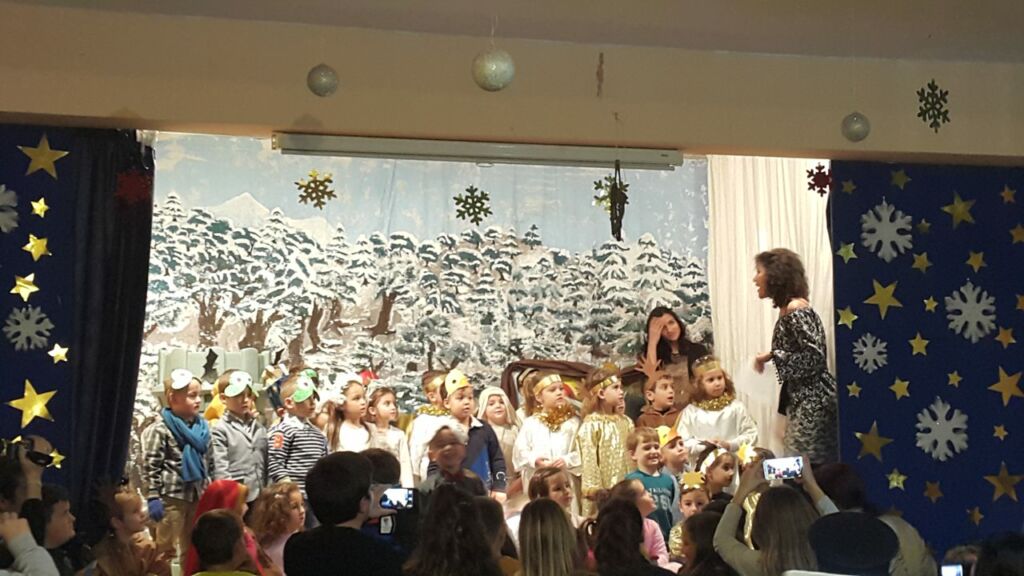 Children singing Greek Christmas carols in Santorini
