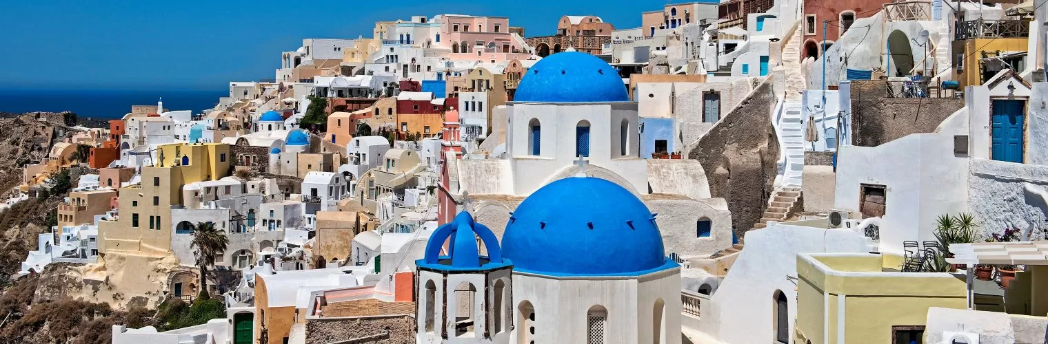 Blue-domed churches you see on the Santorini day tour