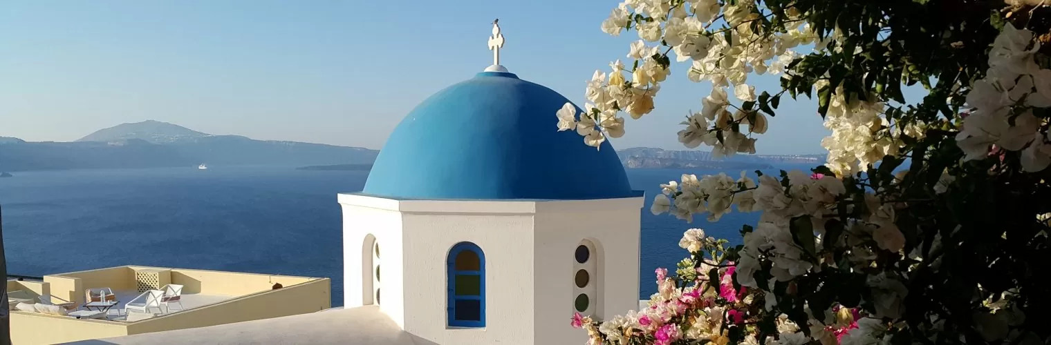 Blue-domed church you see on the Santorini day tour