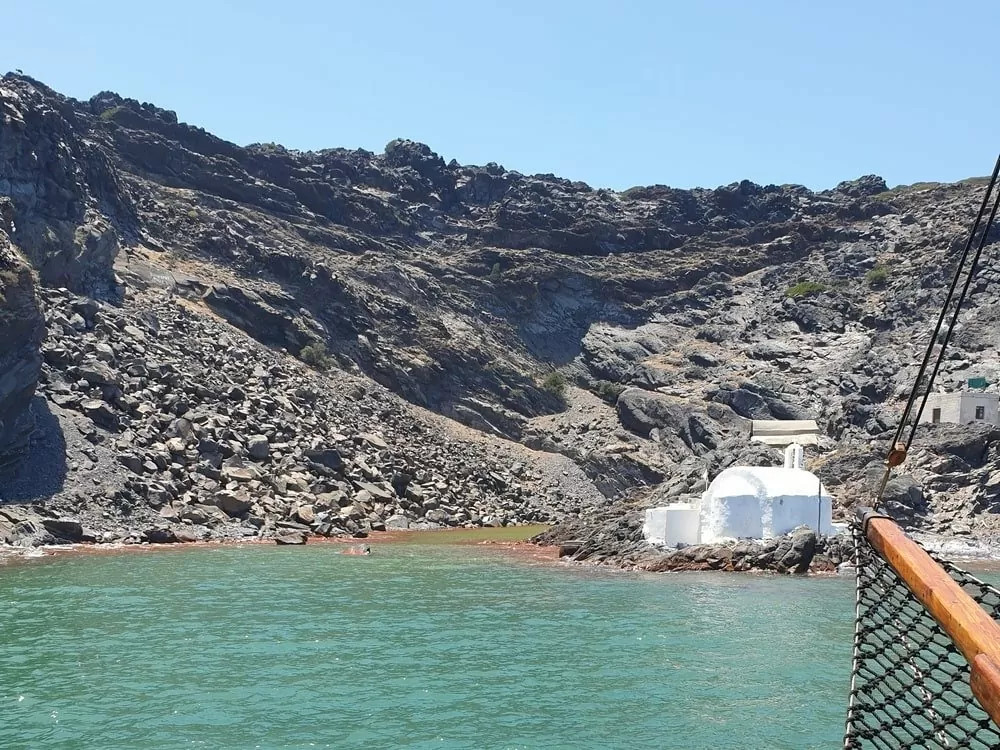 One of the things to do in Fira Santorini is swimming in the hot springs of Palea Kameni