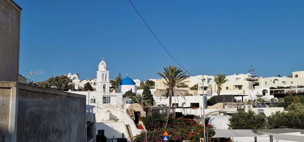 Whitewashed buildings in Megalochori - one of the most beautiful Santorini villages