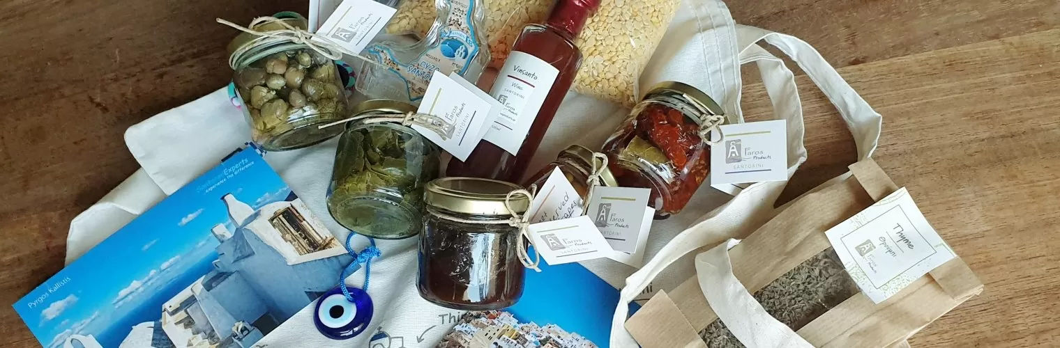 Santorini souvenirs spread on a table