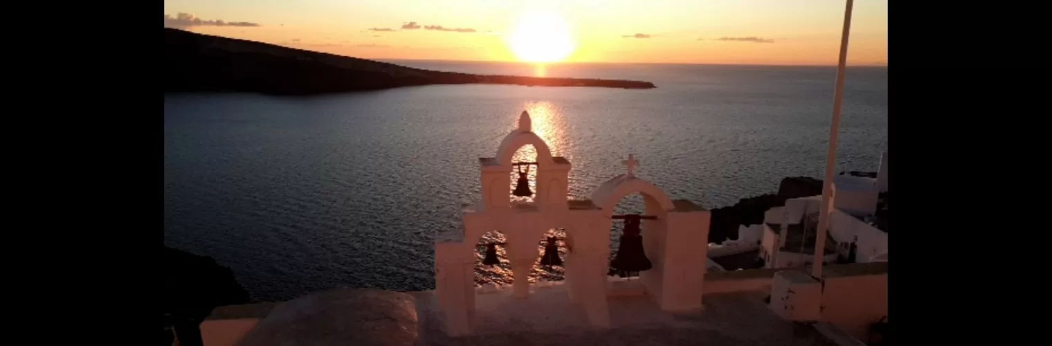 Santorini sunset from the top of a church