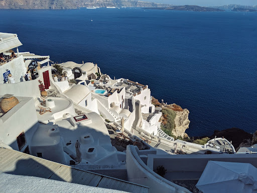Whitewashed housed perched on the caldera of Santorini