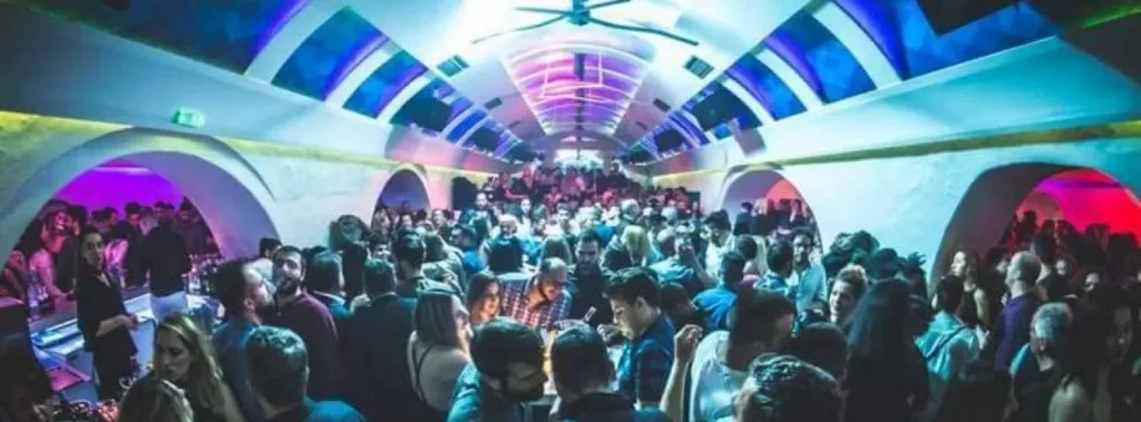 People in a club enjoying the Santorini nightlife