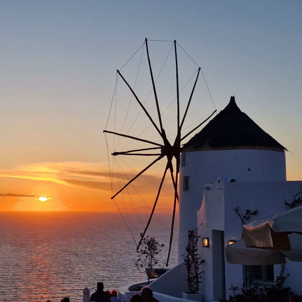 Windmill with Santorini sunset in the backdrop